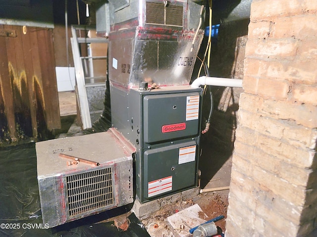 utility room with heating unit