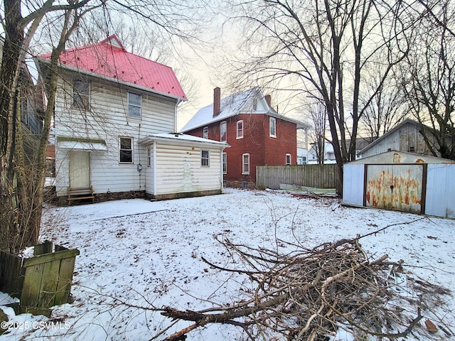 exterior space with a shed