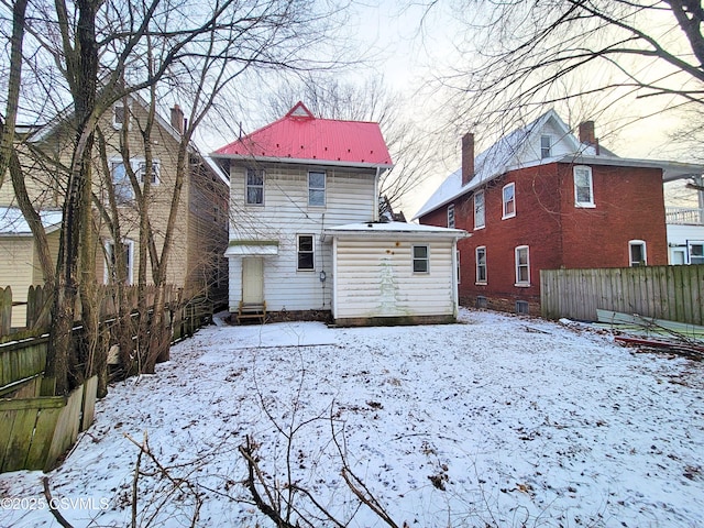 view of snow covered property