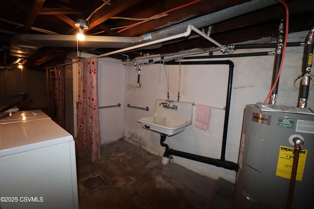 basement with sink, washer / clothes dryer, and water heater