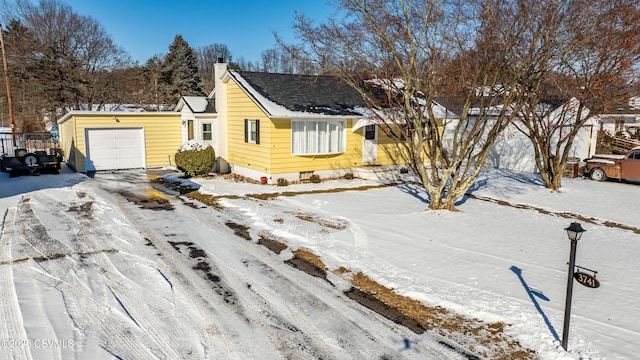 view of front of home featuring a garage