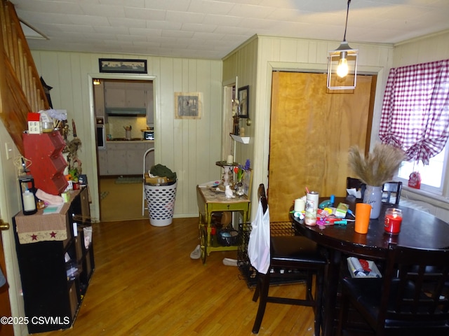 dining room with wood-type flooring