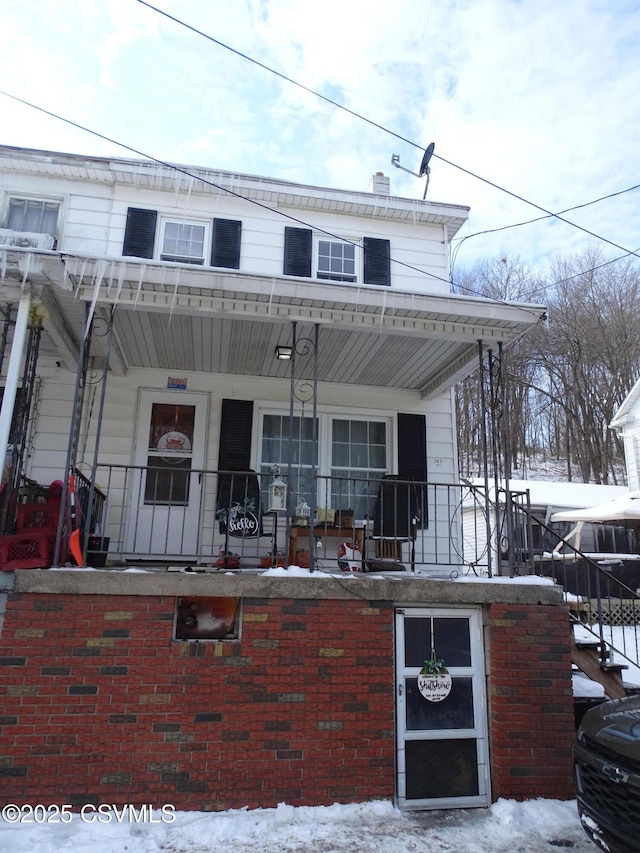 view of front of property featuring covered porch