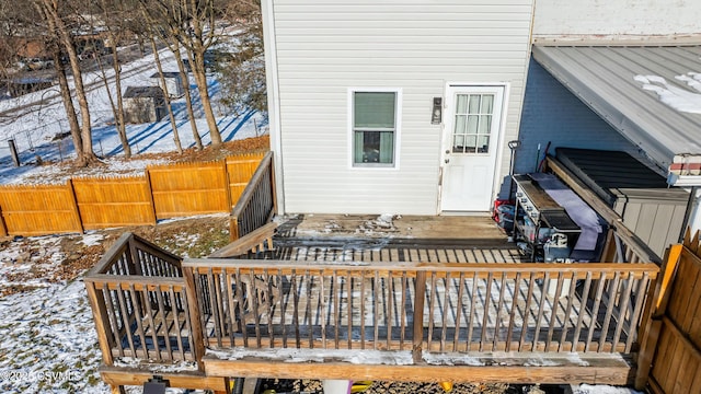 exterior space featuring a wooden deck