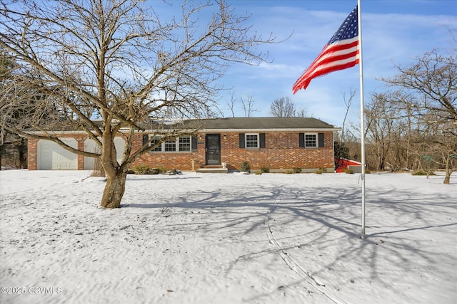 ranch-style house featuring a garage