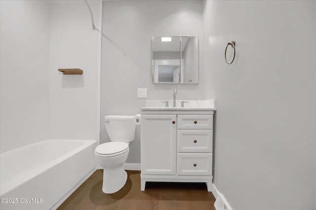 full bathroom with bathtub / shower combination, vanity, and toilet