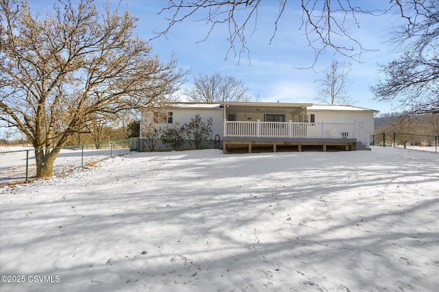 view of snow covered property