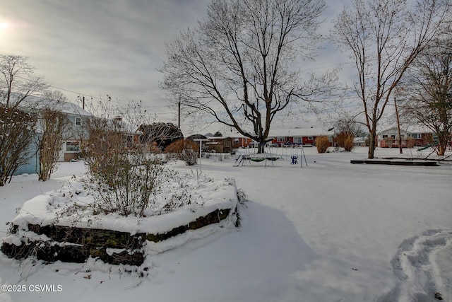 view of yard covered in snow