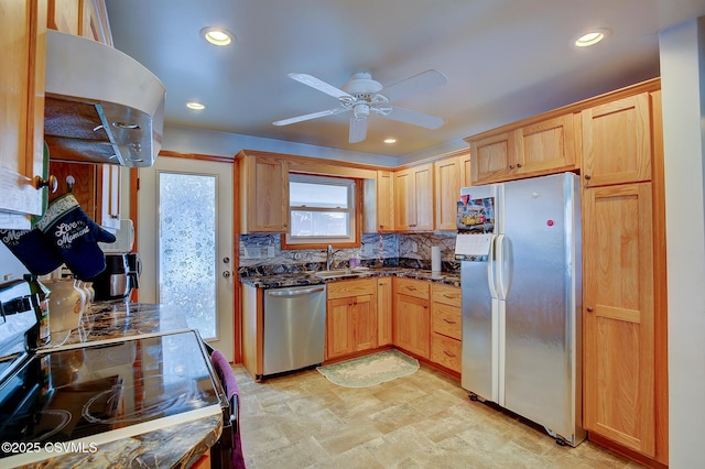 kitchen with sink, ceiling fan, backsplash, stainless steel appliances, and exhaust hood