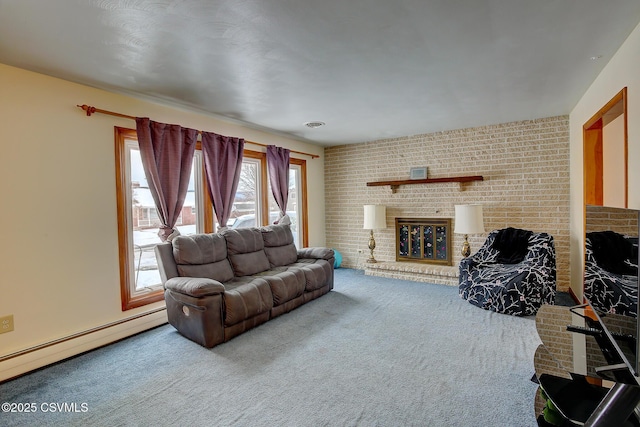 living room featuring a baseboard radiator, a brick fireplace, and carpet flooring