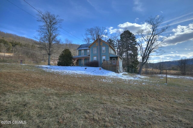 view of home's exterior featuring a yard