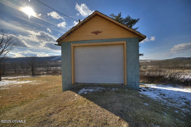 view of snow covered garage