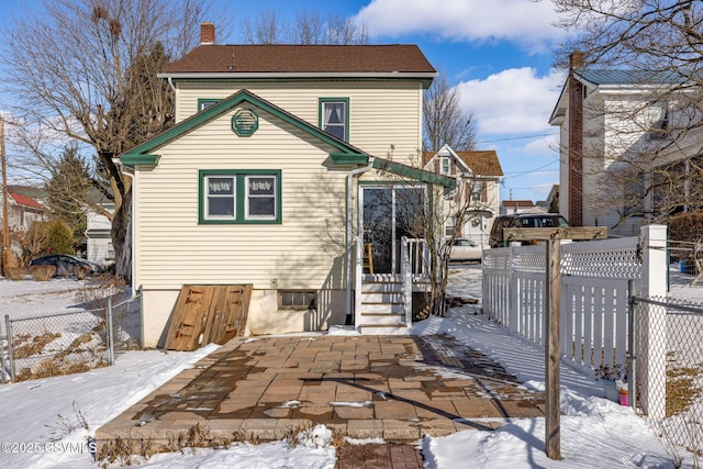 view of snow covered property