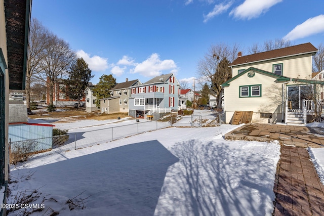 view of yard covered in snow