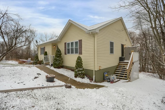 view of snow covered property