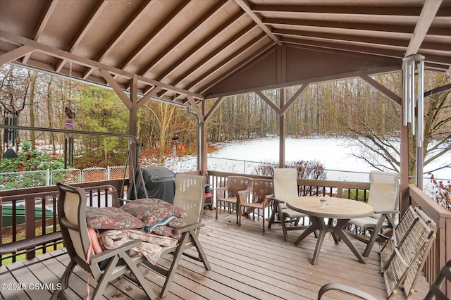 snow covered deck with area for grilling