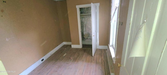 hall featuring hardwood / wood-style flooring