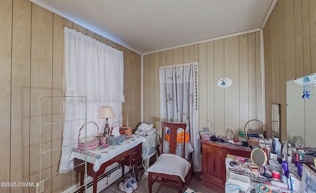 living area featuring ornamental molding