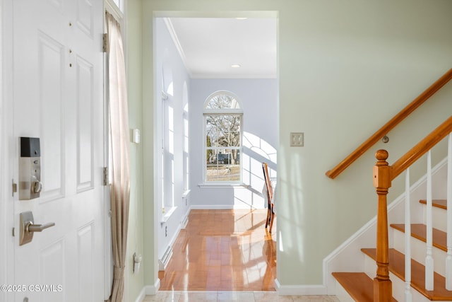 entryway with crown molding