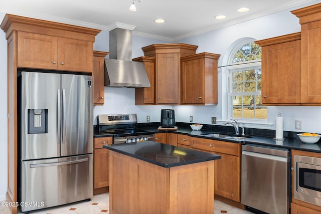 kitchen featuring range hood, sink, ornamental molding, a center island, and stainless steel appliances