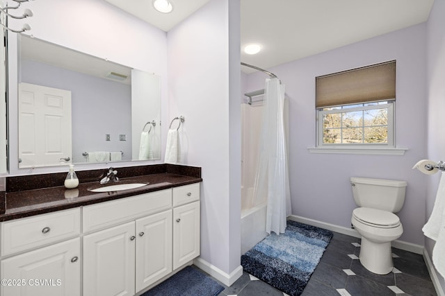 full bathroom with vanity, toilet, and shower / bath combo with shower curtain