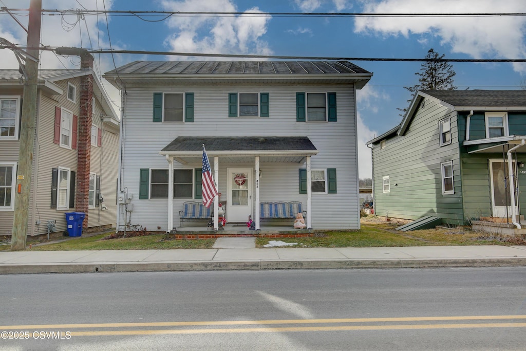 view of front of property featuring covered porch