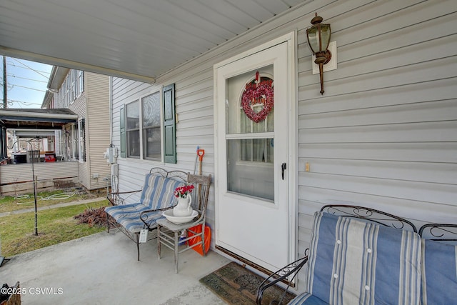 doorway to property with covered porch