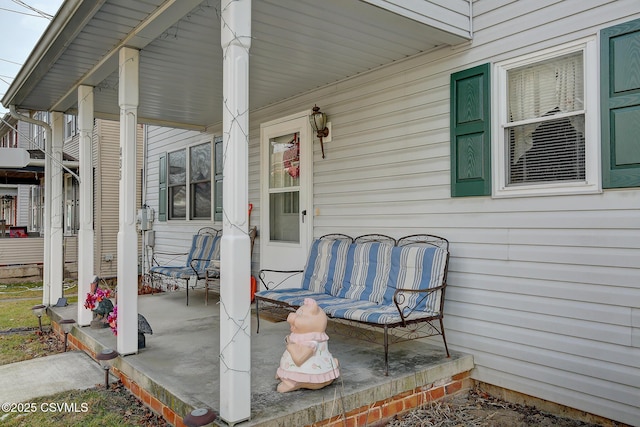 view of patio featuring a porch