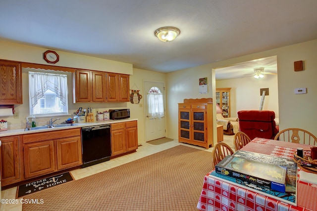 kitchen featuring sink and black appliances