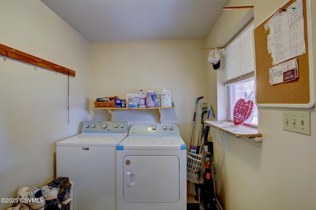 laundry area with separate washer and dryer