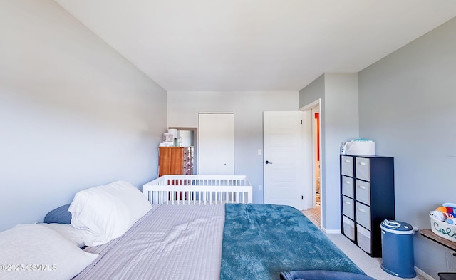 bedroom with light carpet