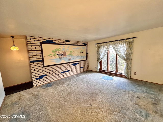 unfurnished living room with carpet floors