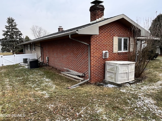 view of home's exterior featuring a yard