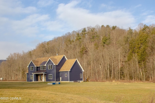 view of front of property with a front lawn