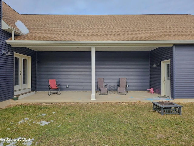 view of patio / terrace featuring french doors and an outdoor fire pit