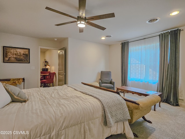 bedroom with ceiling fan and carpet flooring