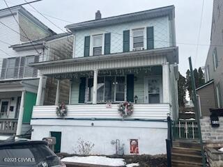 view of front facade featuring covered porch