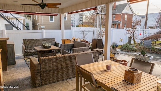 view of patio with an outdoor hangout area and ceiling fan