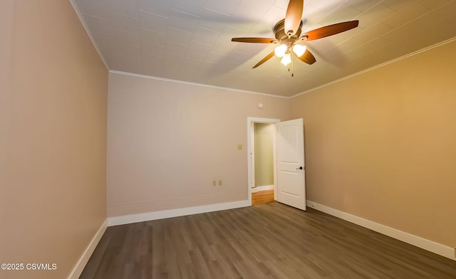 empty room with crown molding, ceiling fan, and dark hardwood / wood-style floors