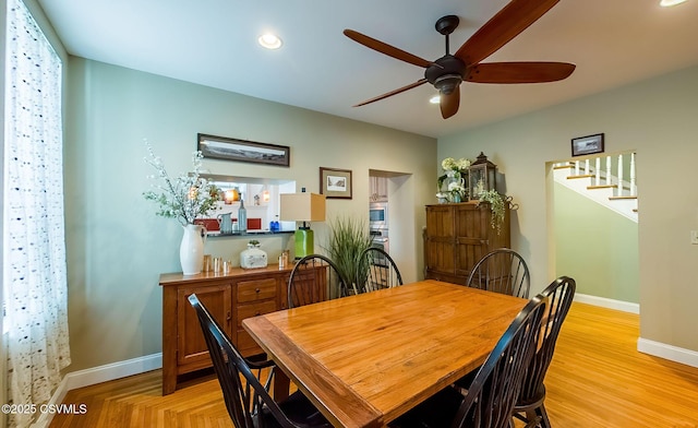 dining room featuring ceiling fan