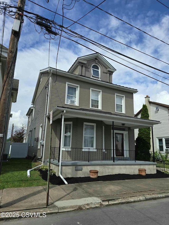 front of property featuring covered porch