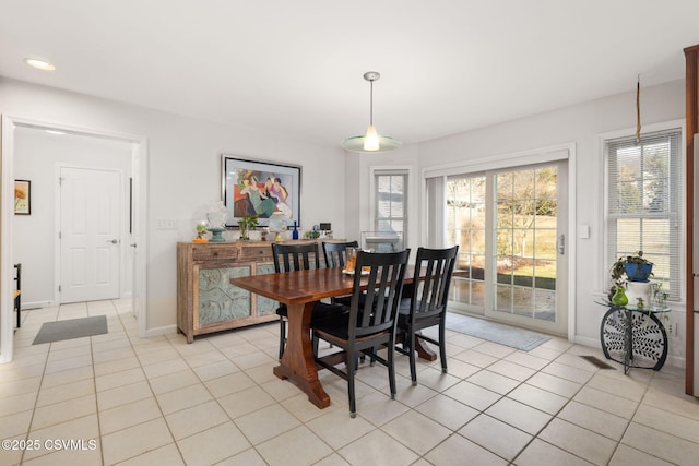 dining space with light tile patterned floors