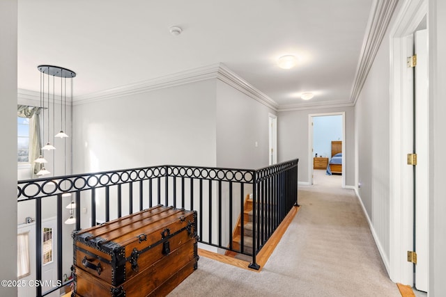 hallway featuring light carpet and ornamental molding