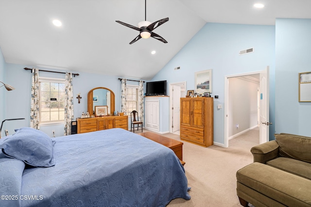 bedroom with light carpet, high vaulted ceiling, and ceiling fan