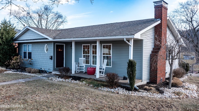 ranch-style home featuring covered porch