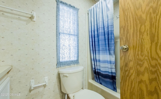 full bathroom with shower / bath combo, vanity, and toilet