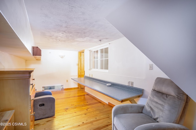 53 W Main St, Bloomsburg, PA 17815 - living area featuring hardwood / wood-style flooring and a textured ceiling
