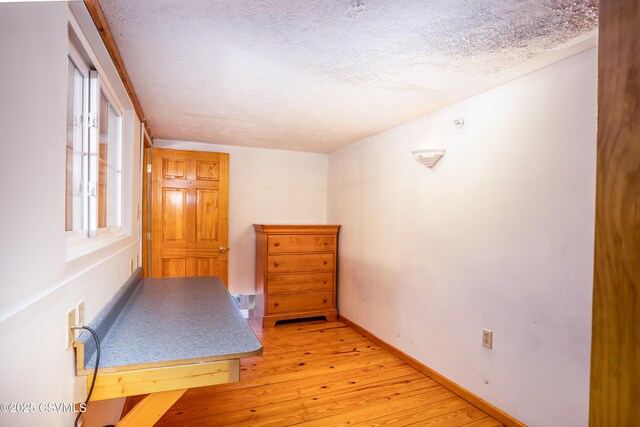 53 W Main St, Bloomsburg, PA 17815 - hall featuring hardwood / wood-style flooring and a textured ceiling