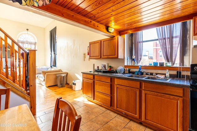 53 W Main St, Bloomsburg, PA 17815 - kitchen with beamed ceiling, sink, and wood ceiling