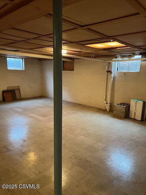 below grade area with light floors